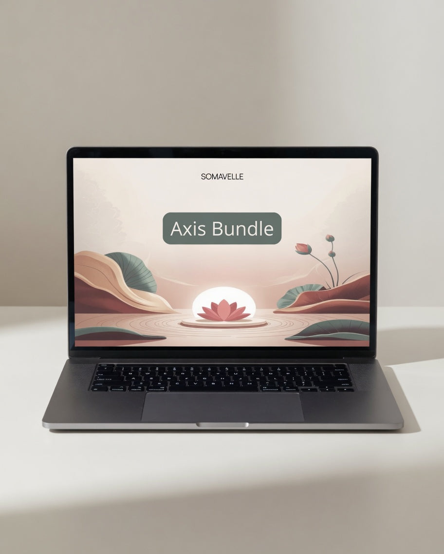 Laptop displaying a scenic design with 'Somaville' branding on a light surface.