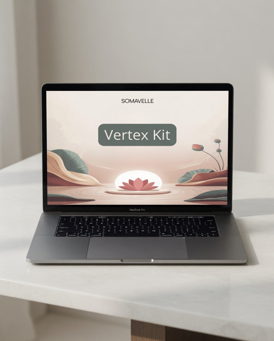Laptop on a white surface with a 'Vertex Kit' screen display